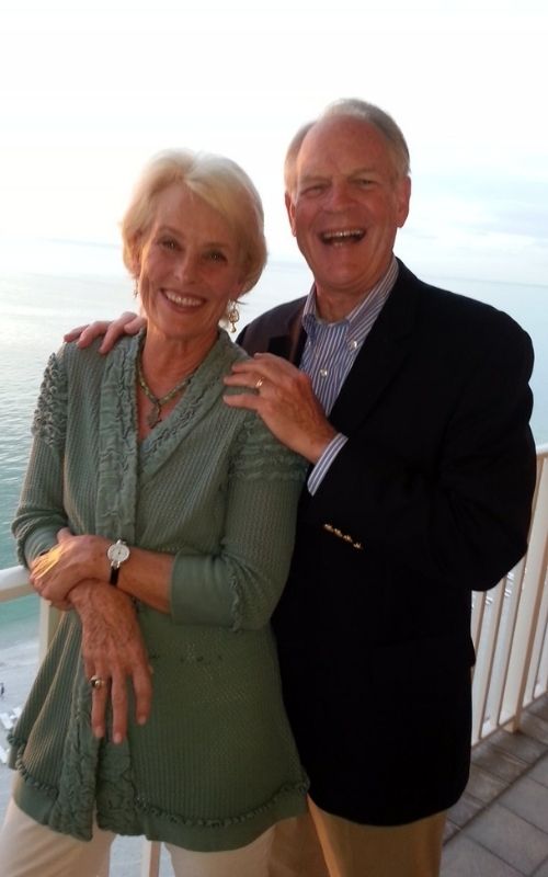 John and Susan Yates standing together overlooking the ocean