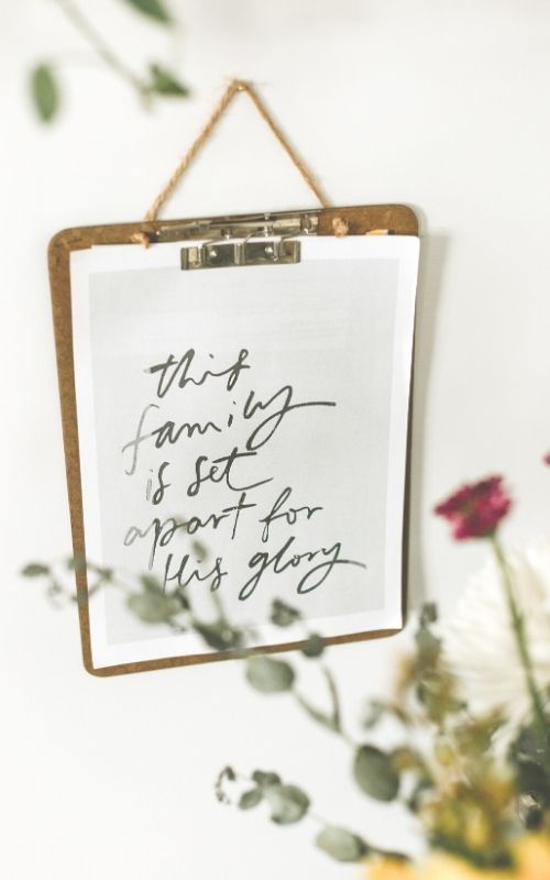 handwritten sign: this family is set apart for his glory